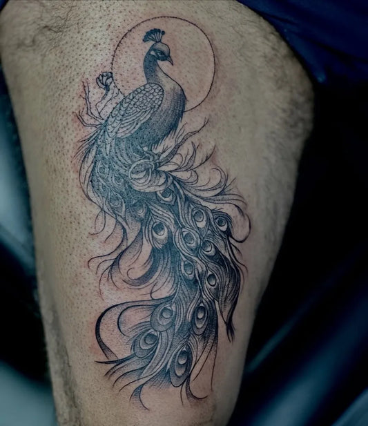 Big Black and Grey Peacock with Moon Tattoo on Men Thigh by @imperial_tattooz_varinder