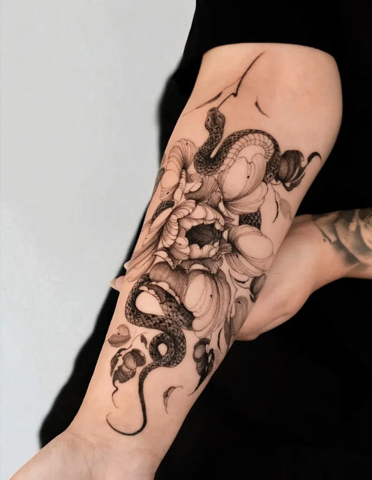 Big Black and Grey Peony and Snakes on Women Arm Tattoo by @amor.tattooer