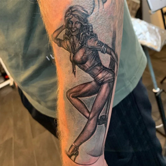 Big Black and Grey Pin Up Girl Tattoo on Men Arm by @pedbreaks_tattoos
