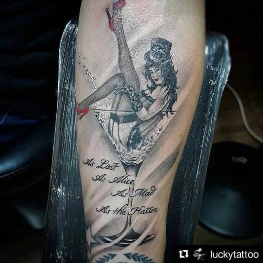 Big Black and Grey Pin Up Girl in Martini Glass Tattoo on Women Arm by @magicinkmagz