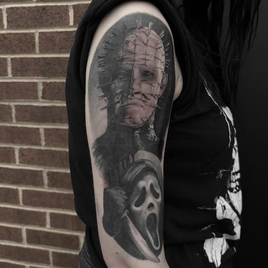 Big Black and Grey Pinhead and Ghostface Horror Tattoo on Women Arm by @medxtattoo