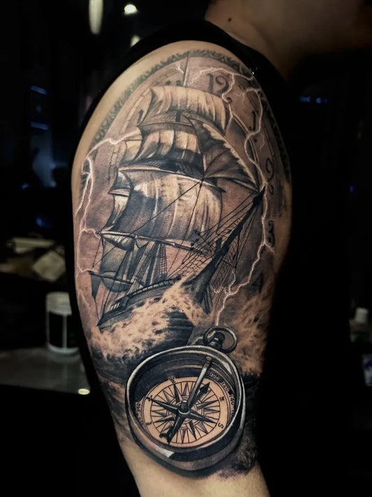 Big Black and Grey Pirate Ship Compass Lightning on Men Arm Tattoo by @chezer13_tattoo