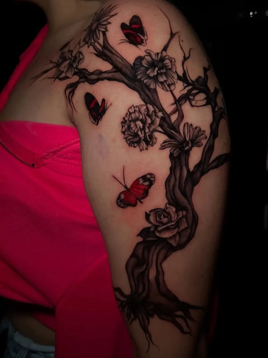 Big Black and Grey Poison Tree Butterflies Flowers on Women Shoulder Tattoo by @crazed.tattoos