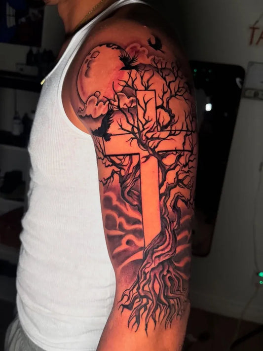 Big Black and Grey Poison Tree Cross with Raven on Men Arm Tattoo by @tattedbyvisions
