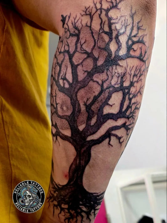 Big Black and Grey Poison Tree on Men Arm Tattoo by @reliable_tattoos