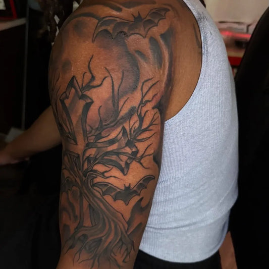 Big Black and Grey Poison Tree with Bats and Branches on Men Arm Tattoo by @tattedbyvisions