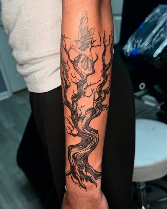 Big Black and Grey Poison Tree with Hummingbird on Men Arm Tattoo by @eqm.art