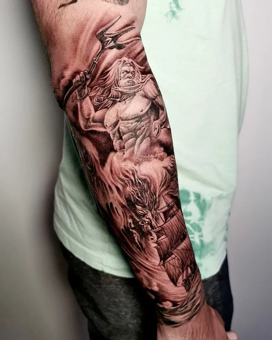 Big Black and Grey Poseidon with Trident Nautical Tattoo on Men Arm by @misfitstattoostudio