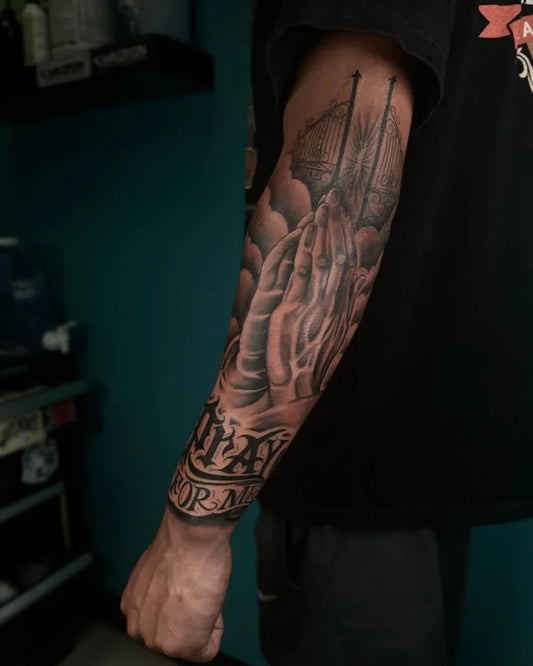 Big Black and Grey Praying Hands Clouds Tattoo on Men Arm by @dmisetattoos