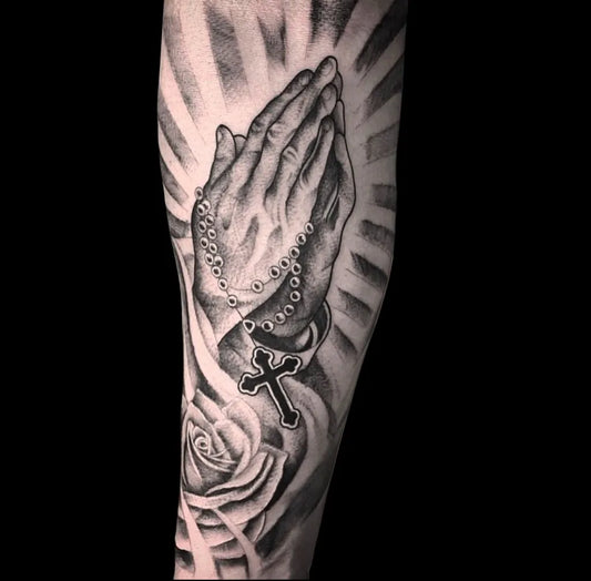 Big Black and Grey Praying Hands Rosary Cross Tattoo on Men Arm by @montauktattoony