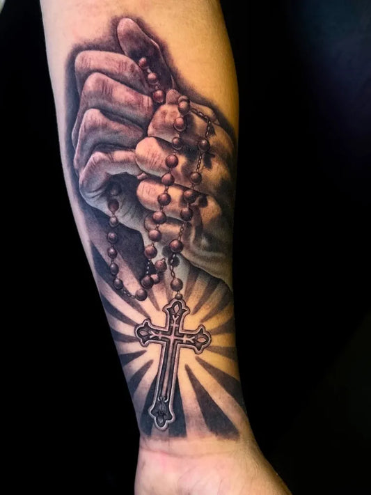 Big Black and Grey Praying Hands with Rosary and Cross Tattoo on Men Arm by @harry_ink_22