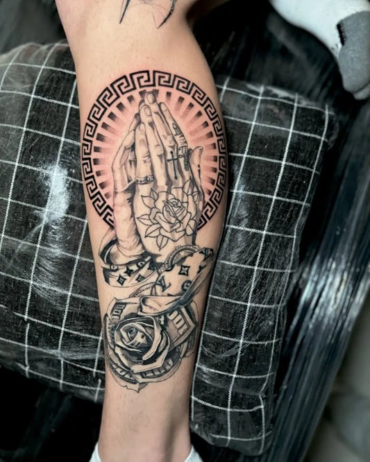 Big Black and Grey Praying Hands with Rose and Greek Key Tattoo on Men Leg by @hillsidetattoostudio