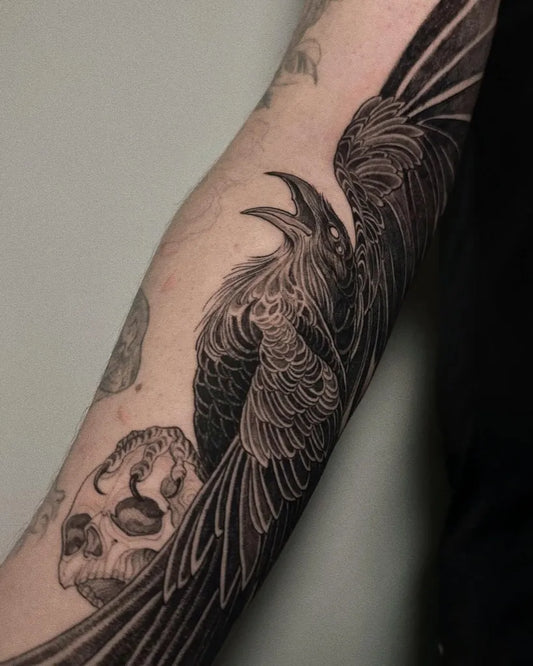 Big Black and Grey Raven Skull on Men Arm Tattoo by @missa.ttt