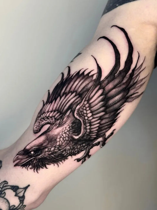 Big Black and Grey Raven on Men Arm Tattoo by @hodu_tattooer