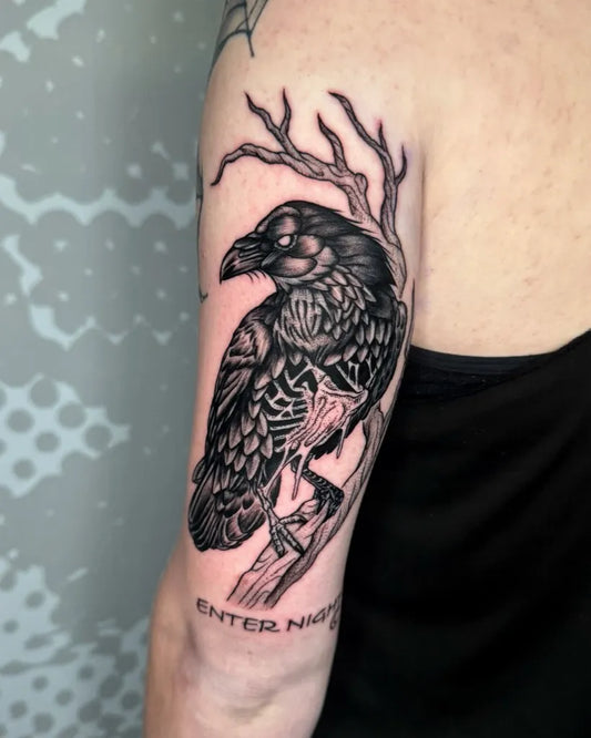 Big Black and Grey Raven on branch on Women Arm Tattoo by @the_rat_tattoo