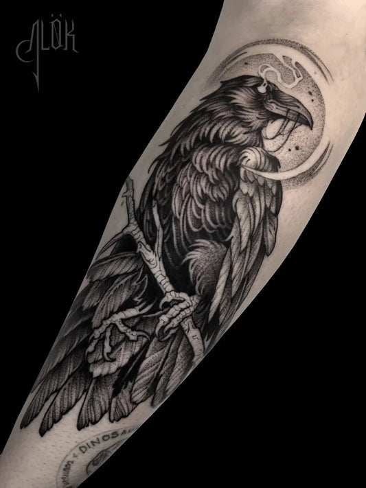 Big Black and Grey Raven with Moon and Branch on Men Arm Tattoo by @carinaalok