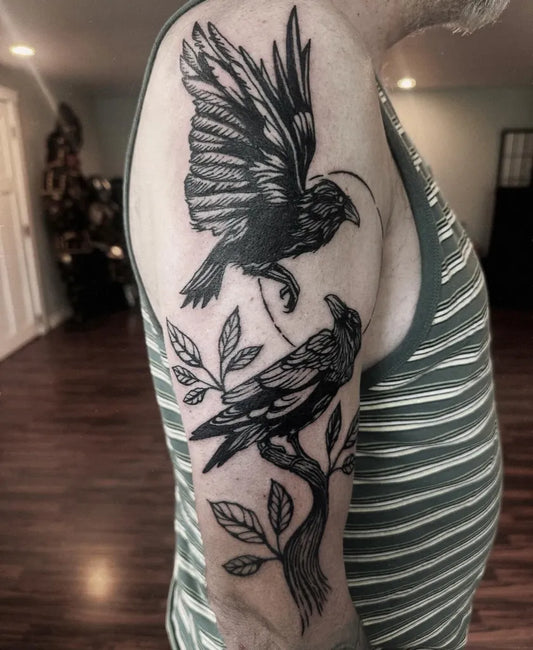 Big Black and Grey Ravens with Leaves and Branch on Men Arm Tattoo by @cassiopeiaurora