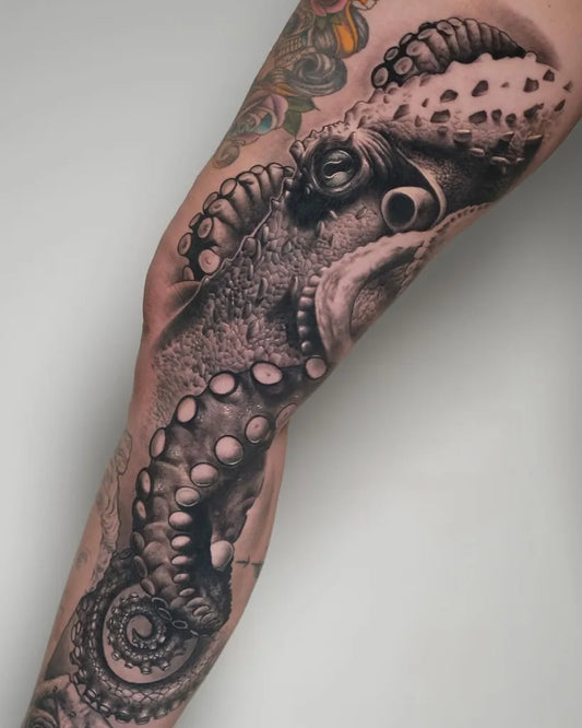 Big Black and Grey Realism Octopus Tattoo on Men Thigh by @miguelameliach
