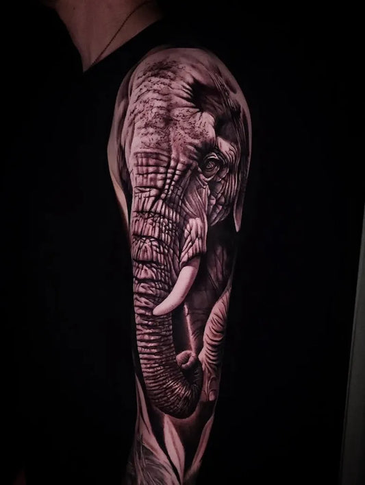 Big Black and Grey Realsim Elephant Sleeve Tattoo on Men Shoulder by @sentienttattoo