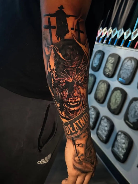 Big Black and Grey Reaper Skull Horror Tattoo on Men Arm by @tattoos.by.cristian