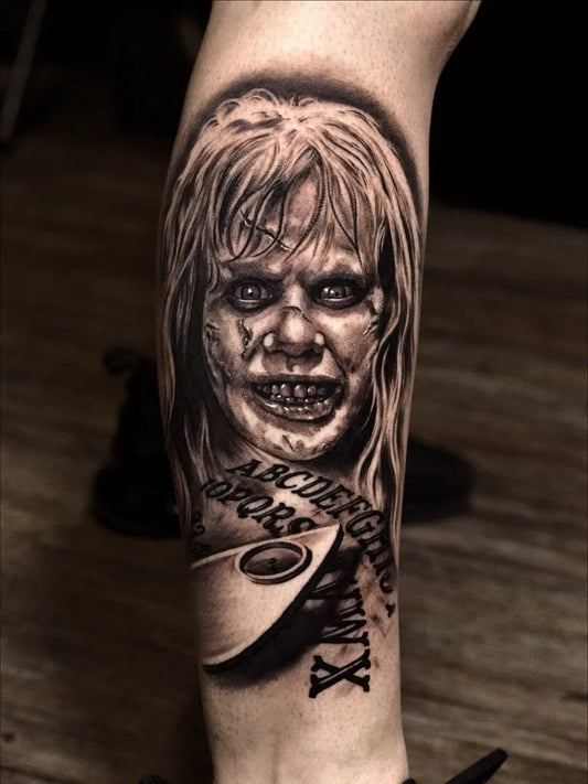 Big Black and Grey Regan MacNeil Horror Tattoo on Women Arm by @kevinflemingtattoo