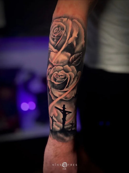 Big Black and Grey Roses and 3 Cross Tattoo on Men Arm by @derailtattoos