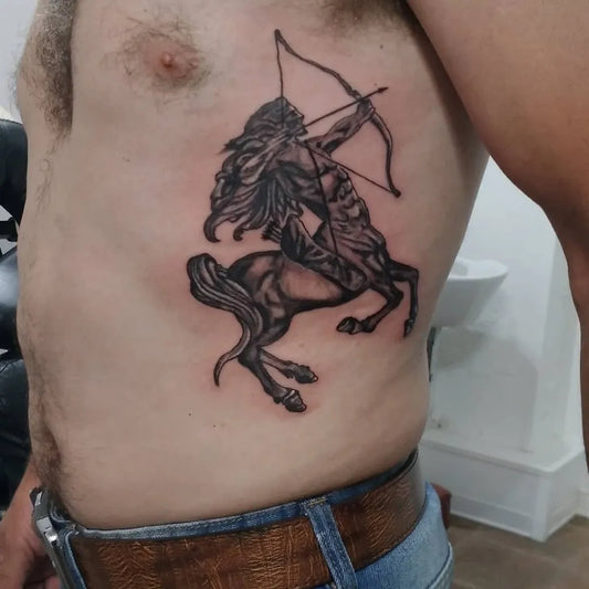 Big Black and Grey Sagittarius Archery Centaur Tattoo on Men Torso by @sandrina_inktattoo