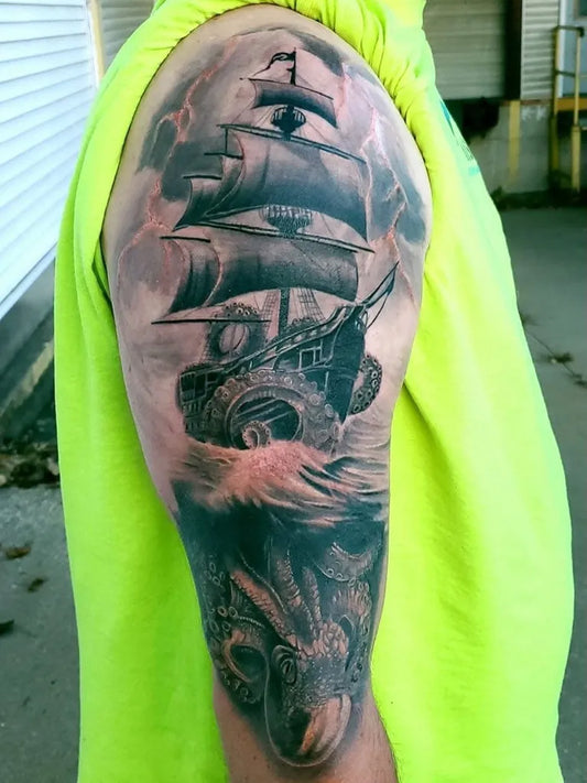 Big Black and Grey Sailing Ship Tattoo on Men Arm by @irezumi.parlor