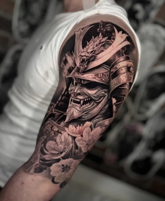 Big Black and Grey Samurai with Hannya Mask and Cherry Blossoms Tattoo on Men Arm by @skinsandneedlesingleby