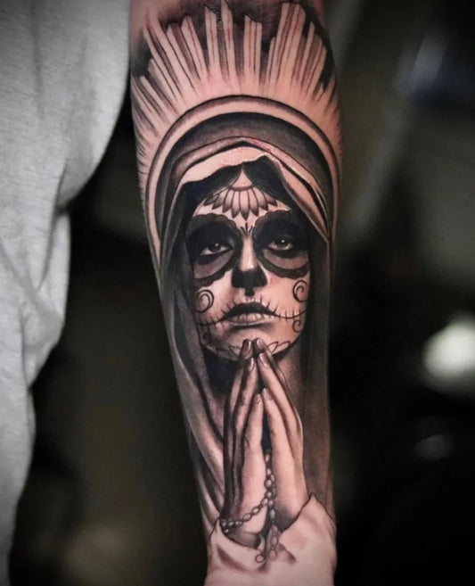 Big Black and Grey Santa Muerte Tattoo on Women Arm by @hideout.tattoo