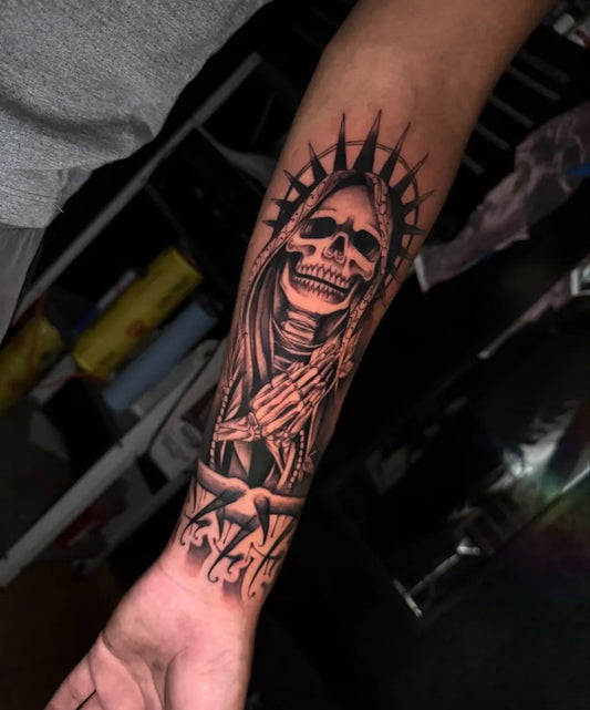 Big Black and Grey Santa Muerte with Halo and Hands Tattoo on Men Arm by @zonder_