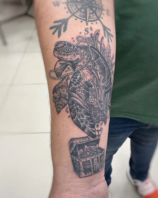 Big Black and Grey Sea Turtle Treasure Chest Tattoo on Men Arm by @ryanloch_tattoo