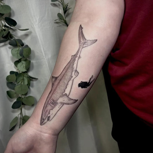 Big Black and Grey Shark and Diver Animal Tattoo on Women Arm by @daddypanda_inked