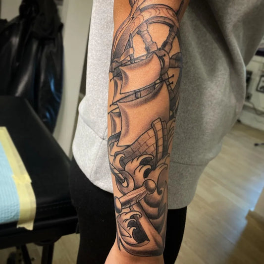 Big Black and Grey Ship and Compass Nautical Tattoo on Men Arm by @tattoosbytopher