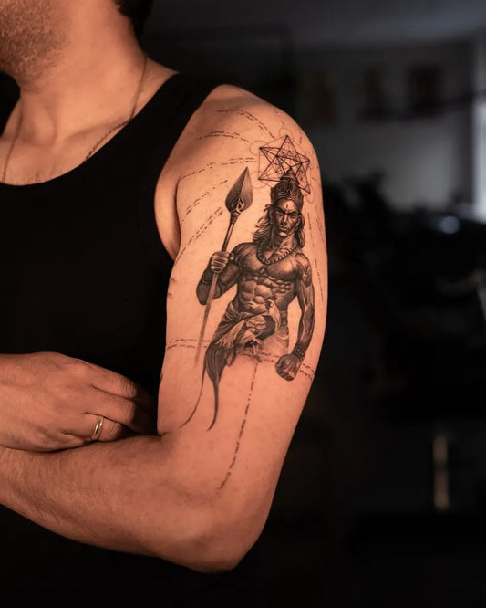 Big Black and Grey Shiva Tattoo on Men Upper Arm by @oliveragergaard