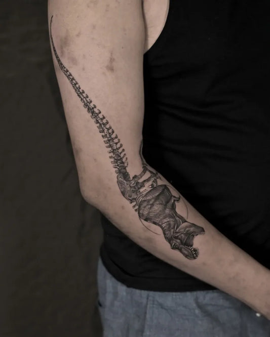 Big Black and Grey Skeleton Dinosaur Tattoo on Men Arm by @samtattooindia