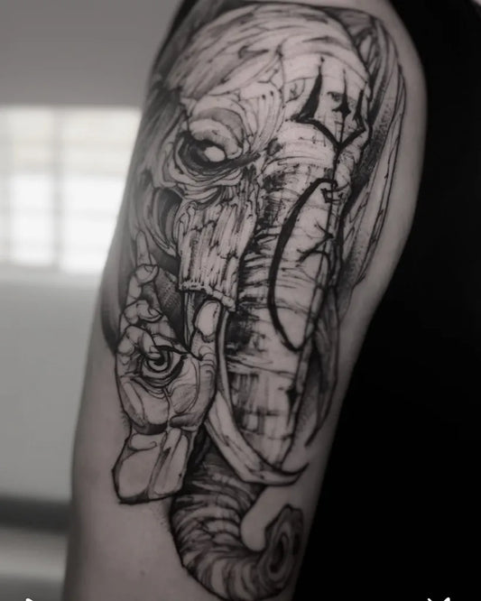 Big Black and Grey Skull Elephant with Rose Men Arm by @danilo.vivanco.tattoo