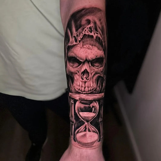 Big Black and Grey Skull and Hourglass Tattoo on Men Arm by @kevinjtattoos