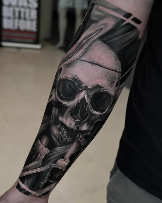 Big Black and Grey Skull with Smoke Tattoo on Men Arm by @thomas.maffeo