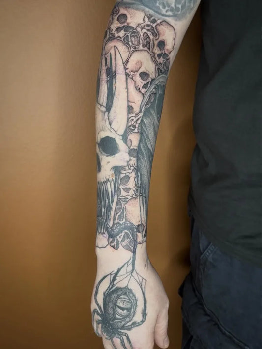 Big Black and Grey Skulls Demon and Spider Tattoo on Men Arm by @robinwilliamstattooer