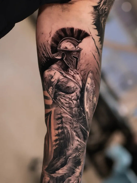 Big Black and Grey Spartan Warrior with Shield and Helmet Tattoo on Men Arm by @tattooist_reset