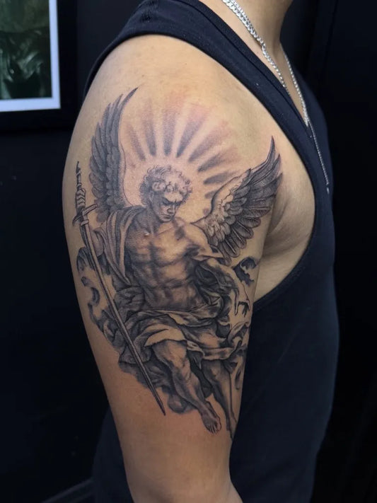 Big Black and Grey St Michael Angel Tattoo on Men Upper Arm by @lovamonjean