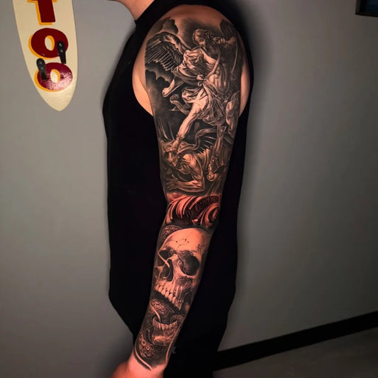 Big Black and Grey St Michael Angel and Skull Tattoo on Men Arm by @artistic__endeavors