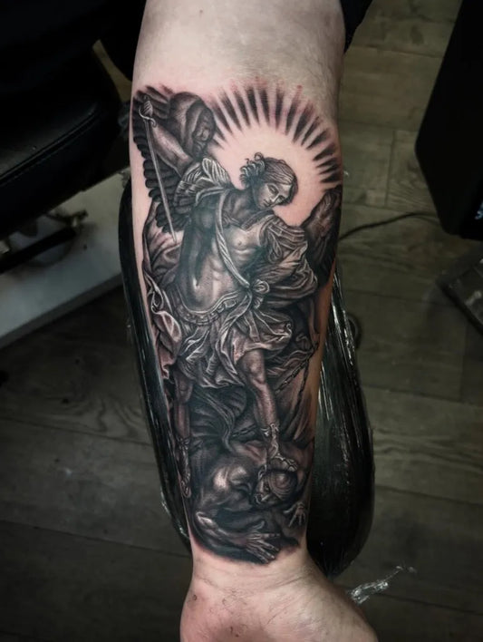 Big Black and Grey St Michael Slaying Dragon Tattoo on Men Arm by @donebyanna