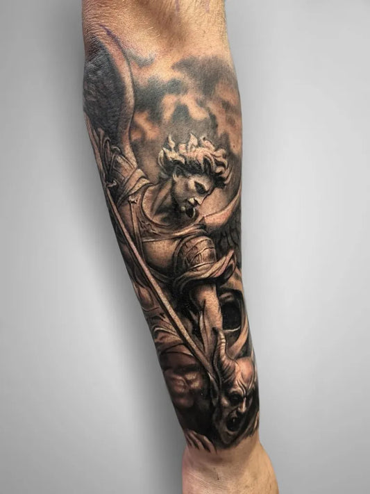 Big Black and Grey St Michael Slaying Dragon Tattoo on Men Arm by @wyl_parkes