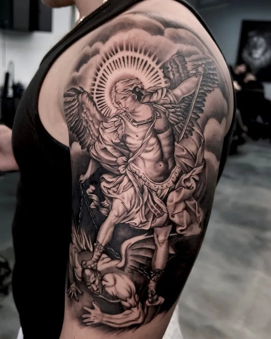 Big Black and Grey St Michael Slaying Dragon Tattoo on Men Shoulder by @_ninjatattoo