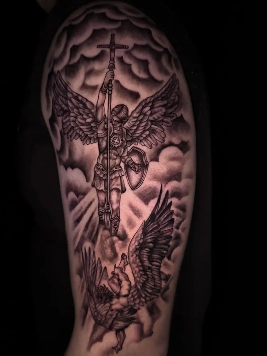Big Black and Grey St Michael Slaying Dragon Tattoo on Men Shoulder by @charlie_g_tattoos