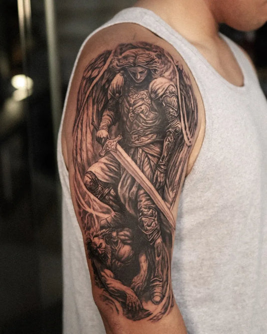 Big Black and Grey St Michael Slaying Dragon Tattoo on Men Shoulder by @sipachaotattoo