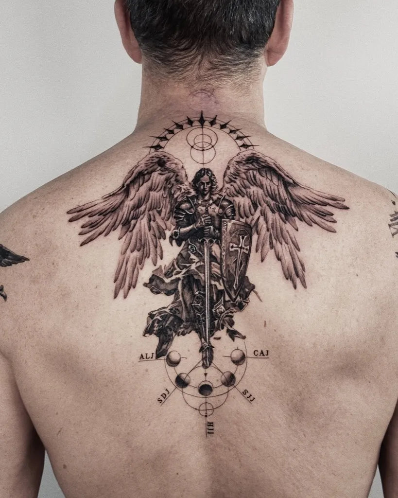 Big Black and Grey St Michael with Wings and Celestial Symbols Tattoo on Men Back by @charleeink_