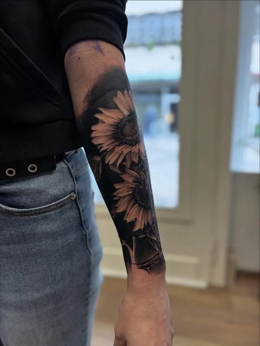 Big Black and Grey Sunflower on Women Arm Tattoo by @handroo00